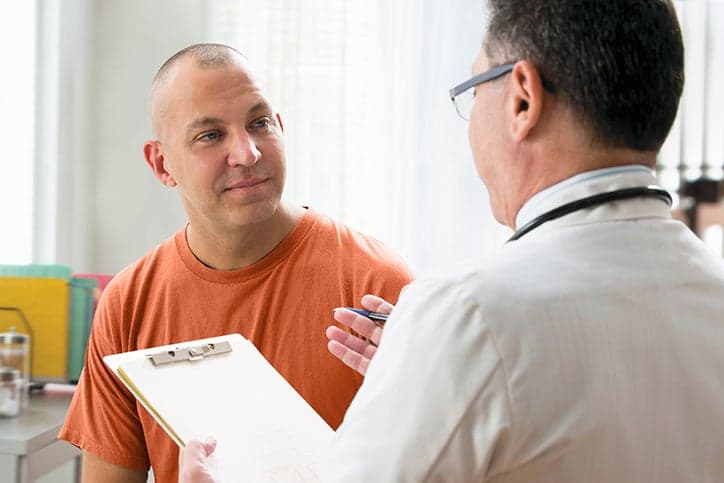 Man talking to a medical specialist