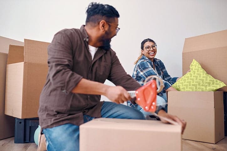 Two people moving house